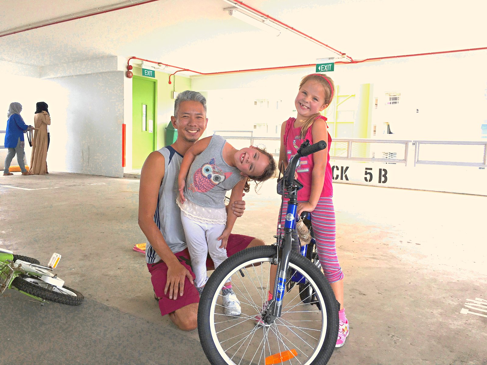 Coach Fai with young students after cycling lesson